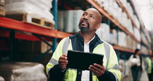 Logistics, inspection and black man in warehouse on tablet for stock control