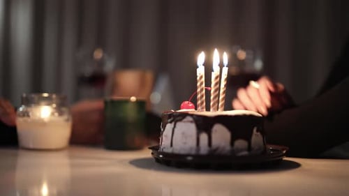 Birthday Cake Candles Burning at Night Celebration