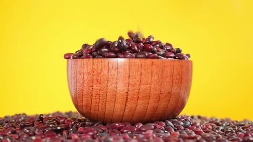 Red Kidney Beans Overflowing from a Wooden Bowl