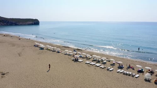 People Relaxing on Sea Beach