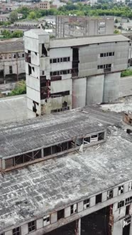 Aerial view of the largest abandoned factory. Factory ruins. Vertical video
