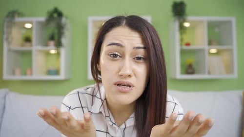 Worried Woman Talking Indoors, Communicating Problems