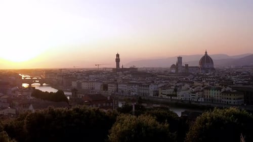 4k Aerial panorama of Florence city, Arno River and Ponte Vecchio at sunset. Florence city in Italy