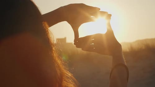 Framing the Sunset on a Golden Beach Day
