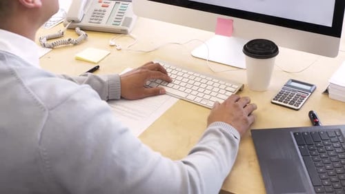 Businessman Talking Working at Computer in Office 4549 Years
