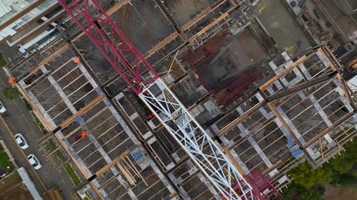 Aerial Video of Multi Level Structure with Active Tower Crane