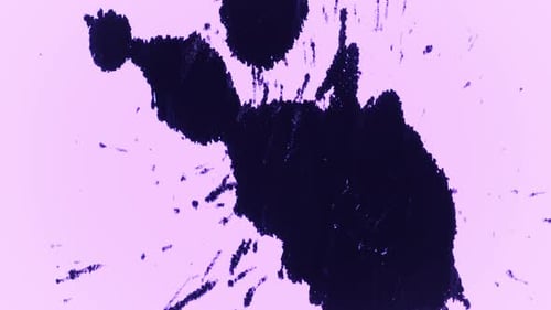 Dark purple paint splatter on light purple