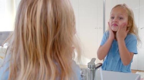 Little Girl Washing Her Face