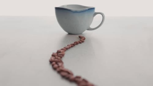 Coffee Beans Artistically Arranged And A UniqueTraditionally Designed Cup - close up shot