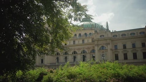Revealing shot of Juliusz Słowacki Theatre opera-theatre house in the heart of Kraków, Poland.