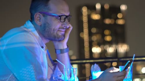 Night Skybar Smartphone Browsing