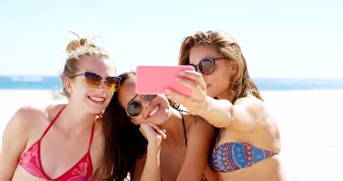 4k video footage of three best friends taking selfies on the beach