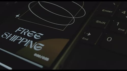 Free Shipping Inscription on Smartphone Screen Designer Making an Advertisement Design on Mobile App