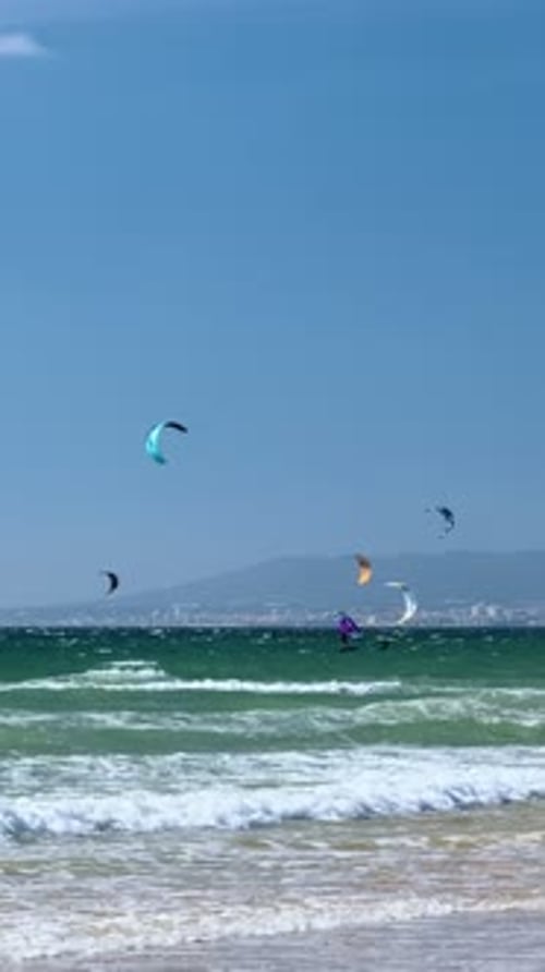 Kiteboarding Kitesurfing Kiteboarder Kitesurfer Kites on the Ocean Beach