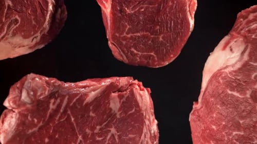 Beef Ribeye Steak Fly Up and Falls Down Filmed on a Highspeed Camera at 1000 Fps