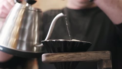Pouring Hot Water for Coffee Brewing Close Up