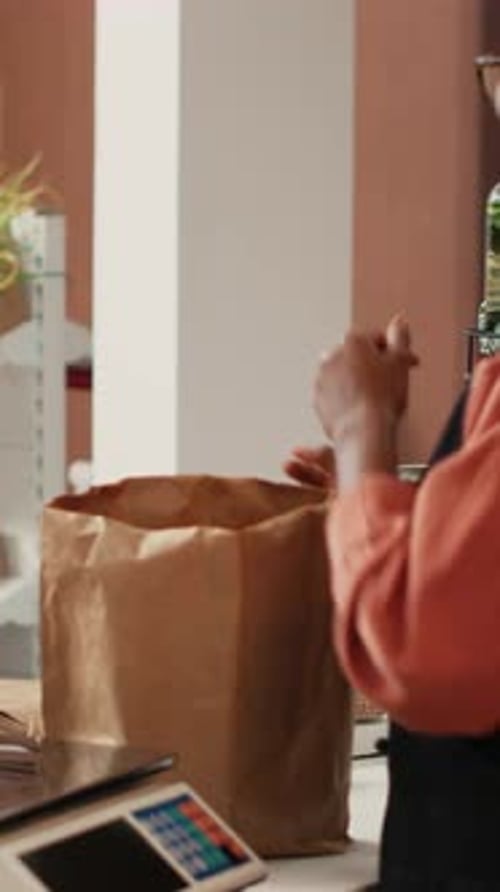 Grocery Store Customer Purchases Jars of Food