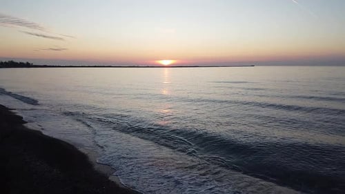 Beautiful vibrant high contrast sunset flyove over the Baltic sea at Liepaja Karosta war port Northe