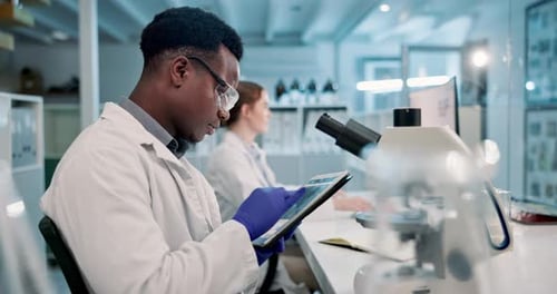 Scientists Conducting Research in Modern Laboratory