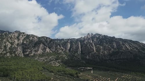 Aerial drone flying near montserrat mountain in barcelona, spain
