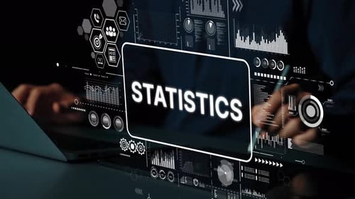 Business professional analyzing digital statistics data with modern technology in a dark office envi