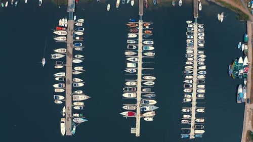 Drone shot. Flying above the yachts, boats and motorboats moored in the marina in Jastarnia, Poland.