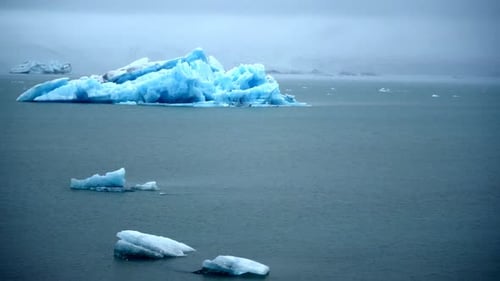 Glacier Lake In Iceland With Blue Colored Ice