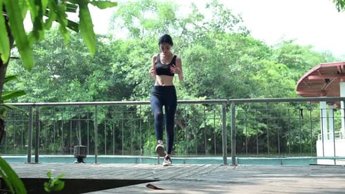 Teenage girl with holiday activities, Doing holiday morning exercise in the park.