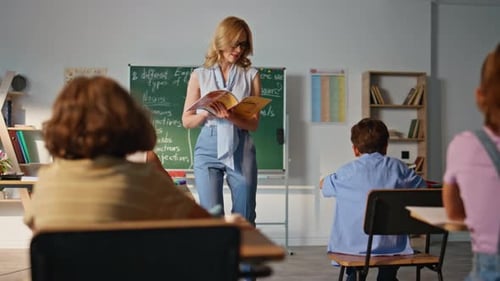 Educator Teaching Group Pupils Elementary School Woman Teacher Reading Book