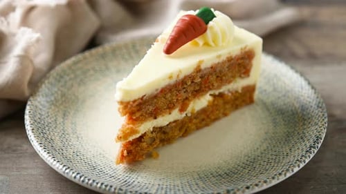 Fork Taking Bite of Carrot Cake Dessert