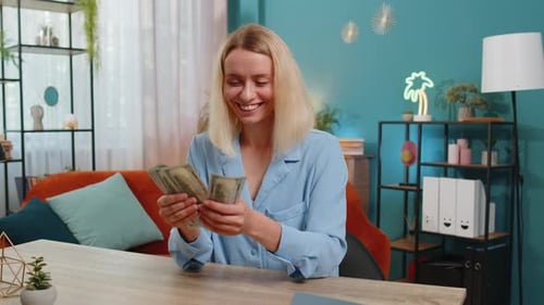 Smiling Businesswoman Counting Cash Money Dollar Checking Salary Enjoy Richness at Office Workplace