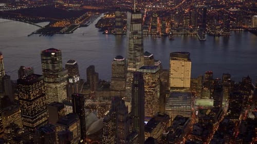 Stunning Aerial View of New York City at Night Showcasing Skyline and Nearby Water