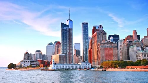 New York City skyline at sunset from the water.