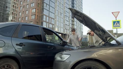 Two Cars Collide in Urban Environment