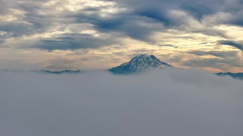 Cloudscape Revealed Prominent Peak Of Mount Rainier In Washington, USA. Aerial Shot