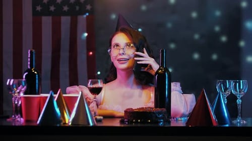 Young Woman Celebrates Birthday on Phone