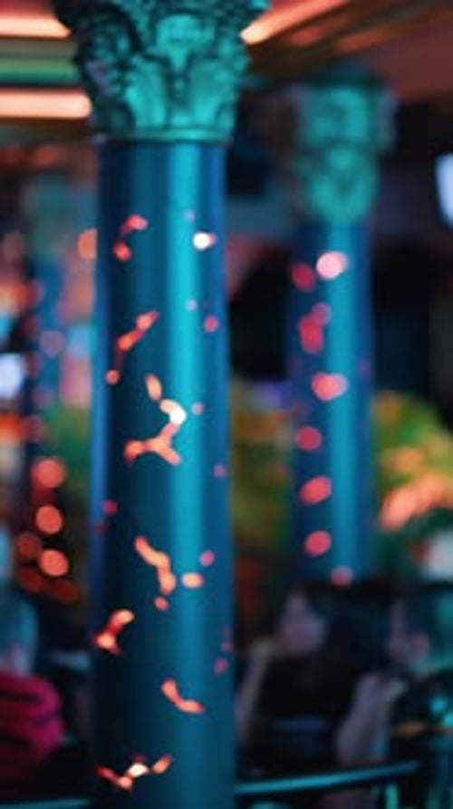 Crowded Bar with Colorful Lights at Night