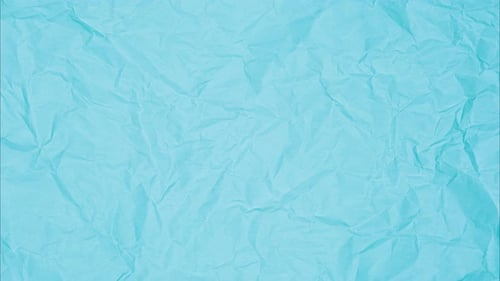 Video Top View of Wrinkled Textured Light Blue Paper Blue Crumpled Paper Texture Background Wrinkled