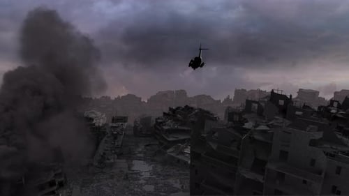 Military Helicopter flying above Bombarded city after war, aerial view.