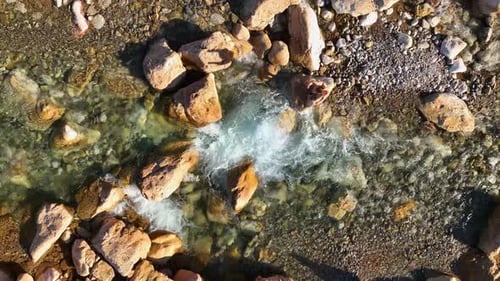 Man Athlete Practicing Playing Sports and Yoga on the Bank of the River at Sunset