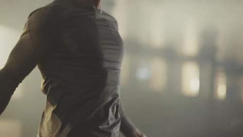 Man Doing Jump Rope Workout in Gym