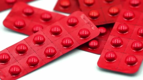 Red Pills in Blister Packs