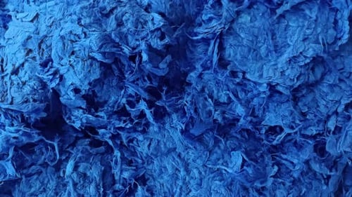 Extreme Close Up of Textured Crumpled Light Blue Paper