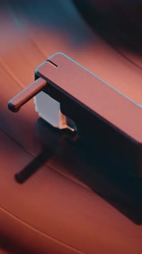 Macro Close Up of Vinyl Record Spinning On Vintage Turntable Playing Classic Music