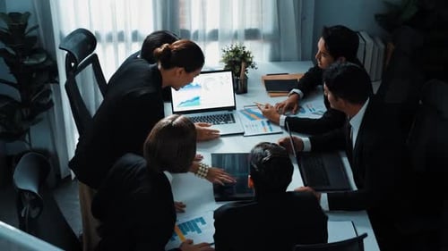 Top view of skilled analytic analysis investment data at meeting. Directorate.