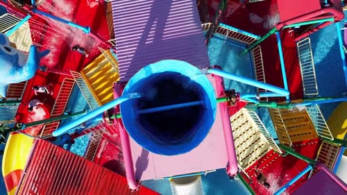 Aerial Top View of Tropical Resort with Adventure Waterpark Aquapark Water Slides and Pool Area