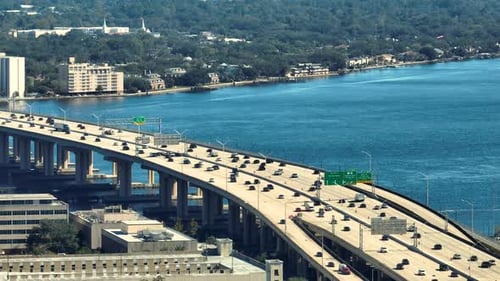 American Freeway Intersection Bridge with Fast Driving Cars and Trucks