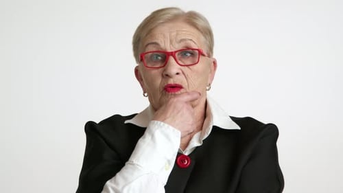 Attractive Elegant Senior Teacher in Spectacles Sighing Heavily Thinking