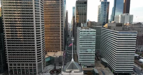 Aerial view of city street with American flag