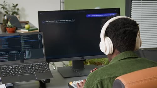 Black Male Software Engineer Watching AI Vibe Coding Agent Writing Script